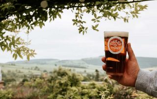 three tuns brewery beer in glass